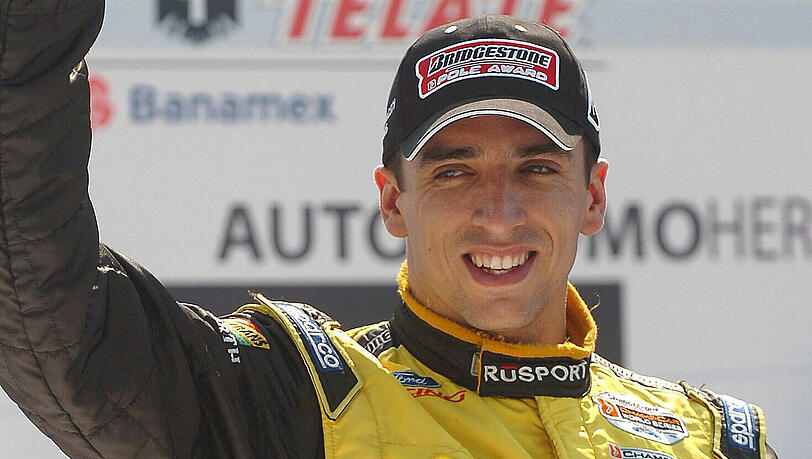 Justin Wilson wurde während eines Indy-Car-Rennens von einem Trümmerteil am Kopf getroffen Justin Wilson wurde während eines Indy-Car-Rennens von einem Trümmerteil am Kopf getroffen