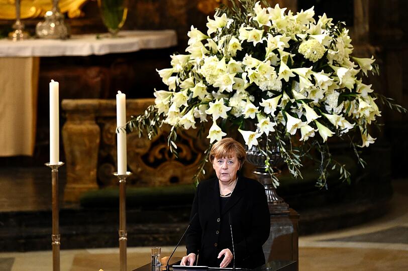 ... Angela Merkel.