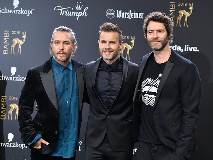 Die Band Take That, Mark Owen (l-r), Gary Barlow und Howard Donald