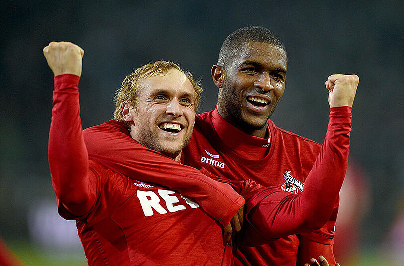 Kölns Marcel Risse (links) jubelt mit seinem Teamkollegen Anthony Modeste über seinen Treffer zum 2:1 bei Borussia Mönchengladbach.