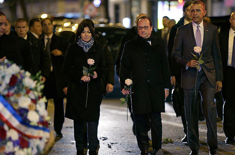 Die Bürgermeisterin von Paris Anne Hidalgo mit Frankreichs Präsident Francois Hollande (m.) und US-Präsident Barack Obama.