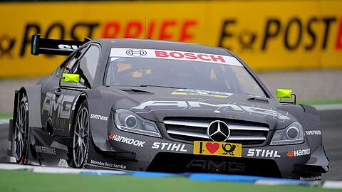Der deutsche Rennfahrer Ralf Schumacher im Mercedes AMG C-Coupe fährt am Sonntag in Hockenheim auf dem Hockenheimring während des Warm-Ups beim ersten Saisonlauf der Deutschen Tourenwagen Meisterschaft.