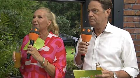 Andrea Kiewel und Rudi Cerne mussten vor dem Unwetter im "ZDF-Fernsehgarten" fliehen.