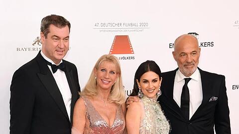 Markus Söder und seine Ehefrau Karin mit Viktoria und Heiner Lauterbach (l-r). Foto: Tobias Hase/dpa