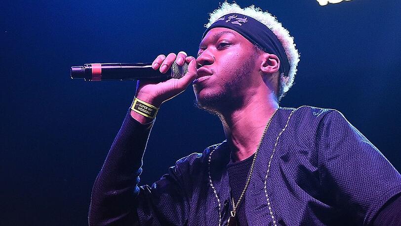 OG Maco w&auml;hrend eines Auftritts im Jahr 2014.