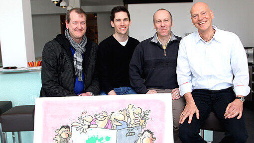 Hinter einer Umzugs-Karikatur von Ralf König (v.l.): Lars Fröhlich, Kai Kundrath, Christian Schultze und Uwe Hagenberg. Hinter einer Umzugs-Karikatur von Ralf König (v.l.): Lars Fröhlich, Kai Kundrath, Christian Schultze und Uwe Hagenberg.