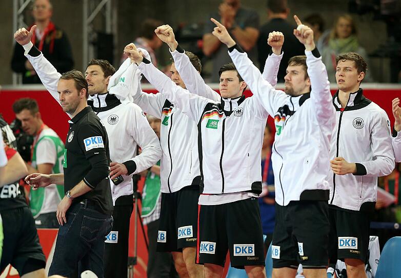Die deutschen Handballer jubeln über die bisherigen zwei Siege gegen Schweden und Slowenien.