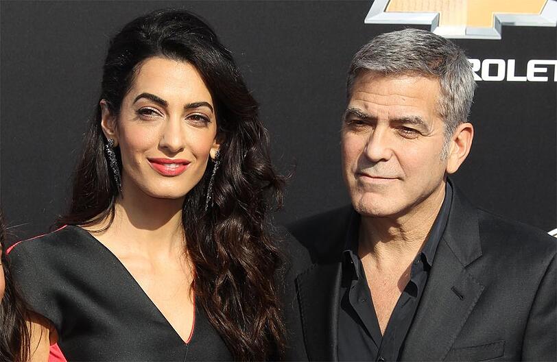 Amal und George Clooney