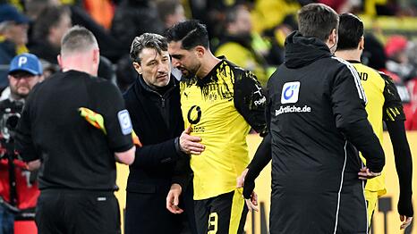 Emre Can (m) musste beim Topspiel gegen den FC Bayern ausgewechselt werden.