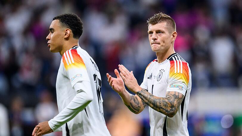 Toni Kroos (r) und Jamal Musiala (Archivbild). Toni Kroos (r) und Jamal Musiala (Archivbild).