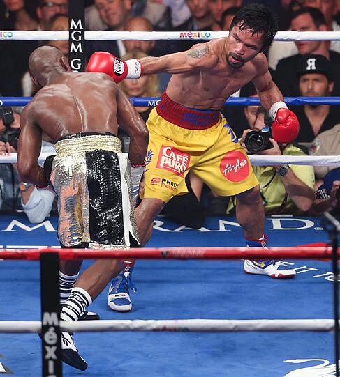 Floyd Mayweather hat den Angriff von Manny Pacquiao im Rekord-Boxkampf erfolgreich abgewehrt und bleibt auch in seinem 48. Profi-Duell ungeschlagen. Der Fight in Bildern.
