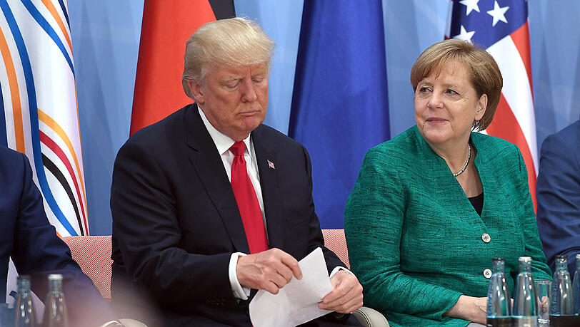 US-Präsident Donald Trump und Bundeskanzlerin Angela Merkel (CDU) beim G20-Gipfel in Hamburg. US-Präsident Donald Trump und Bundeskanzlerin Angela Merkel (CDU) beim G20-Gipfel in Hamburg.