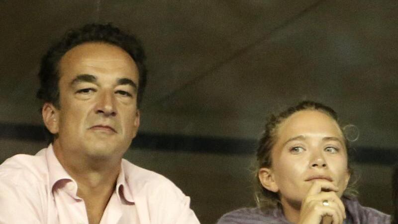 Mary-Kate Olsen und ihr damaliger Verlobter Olivier Sarkozy bei den US Open 2014 in Flushing Meadows. Mary-Kate Olsen und ihr damaliger Verlobter Olivier Sarkozy bei den US Open 2014 in Flushing Meadows.