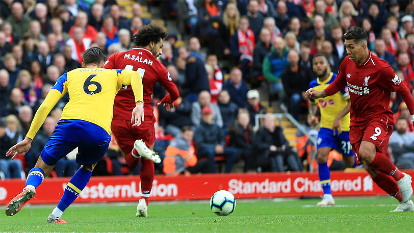 Zack, zack, zack: Mo Salah (Mi.) und Roberto Firmino (re.) bei der Arbeit.