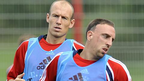 Arjen Robben (l.) und Franck Ribéry sind noch nicht fit genug für die Startelf.