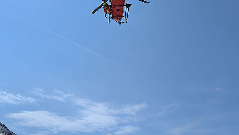 Ein Hubschrauber im Einsatz am 14. Juli am Hocheck. Ein Hubschrauber im Einsatz am 14. Juli am Hocheck.