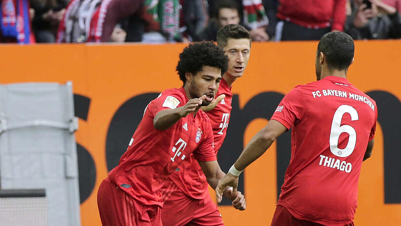 Die Torschützen Gnabry (l.) und Lewandowski (m.) mit Thiago. Die Torschützen Gnabry (l.) und Lewandowski (m.) mit Thiago.