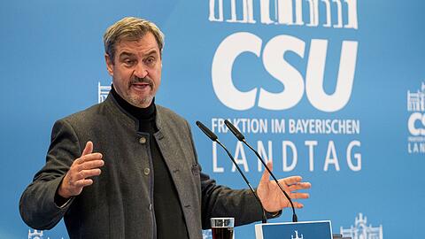 CSU-Parteichef Markus Söder hält eine Abgrenzung von der Politik Angela Merkels für notwendig - vor allem beim Thema Migration.