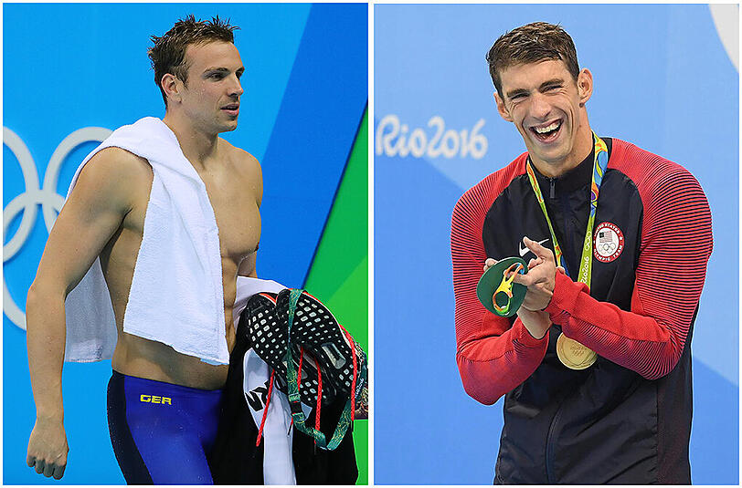 Michael Phelps (r.) hat gut lachen, Paul Biedermann eher nicht.