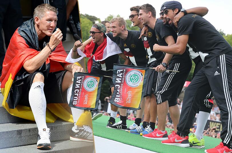 Die Weltmeister sind gelandet und feiern am Brandenburger Tor mit rund 400 000 Fans den vierten WM-Titel für Deutschland. Die Bilder vom Empfang in Berlin.