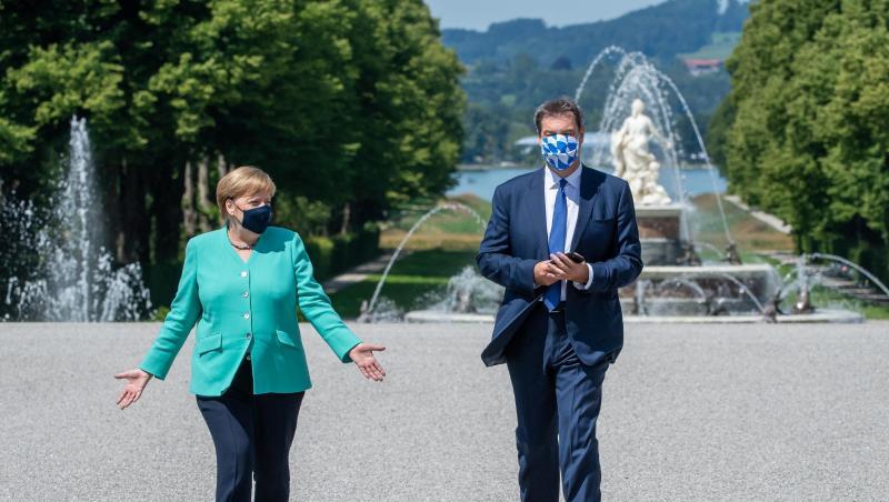 Markus Söder (CSU), Ministerpräsident von Bayern, und Bundeskanzlerin Angela Merkel (CDU). Foto: Peter Kneffel/dpa/Pool/dpa Markus Söder (CSU), Ministerpräsident von Bayern, und Bundeskanzlerin Angela Merkel (CDU). Foto: Peter Kneffel/dpa/Pool/dpa