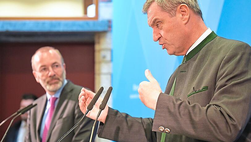 Auf unterschiedlichen Wegen? Markus S&ouml;der (r.). Ministerpr&auml;sident von Bayern, und Manfred Weber, Vorsitzender der EVP-Fraktion im Europ&auml;ischen Parlament.