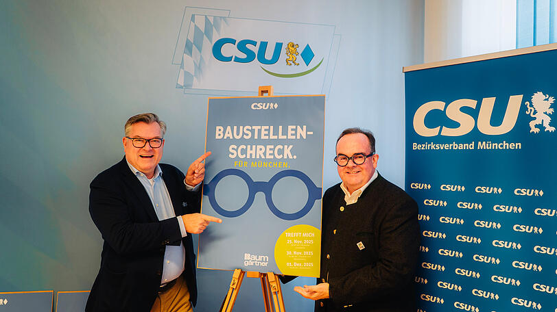 Zwei, die zuversichtlich auf den Wahlkampf schauen: Clemens Baumgärtner (r.) und Seppi Schmid mit neuem Plakat.