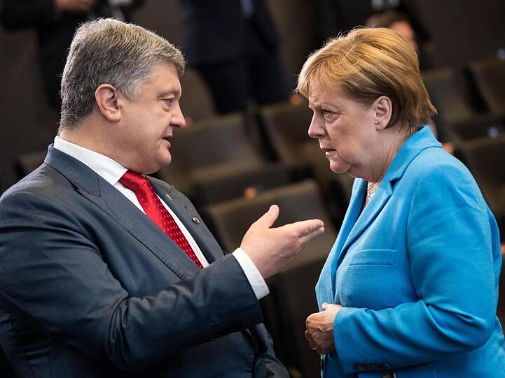 Petro Poroschenko und Angela Merkel bei einem Treffen im Juli 2018.