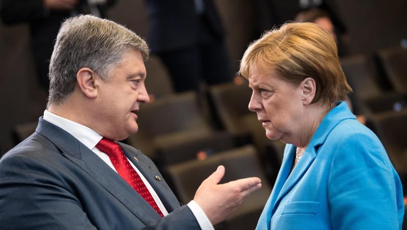 Petro Poroschenko und Angela Merkel bei einem Treffen im Juli 2018. Petro Poroschenko und Angela Merkel bei einem Treffen im Juli 2018.