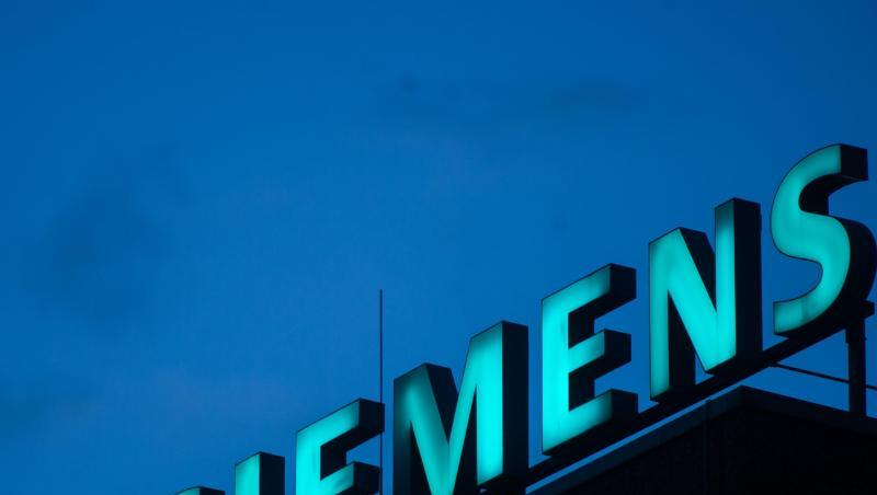 Das Konzern-Logo ist auf dem auf dem Gebäude eines Werks von Siemens zu sehen. Foto: picture alliance/Lino Mirgeler/dpa/Archivbild Das Konzern-Logo ist auf dem auf dem Gebäude eines Werks von Siemens zu sehen. Foto: picture alliance/Lino Mirgeler/dpa/Archivbild