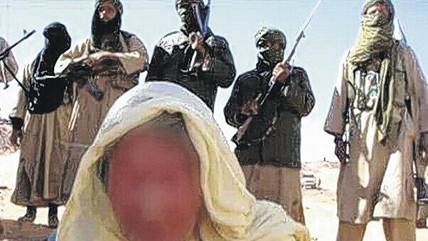 Ein weißes Kopftuch und einen blaues Gewand trägt die Deutsche auf dem von den Terroristen veröffentlichten Ein weißes Kopftuch und einen blaues Gewand trägt die Deutsche auf dem von den Terroristen veröffentlichten