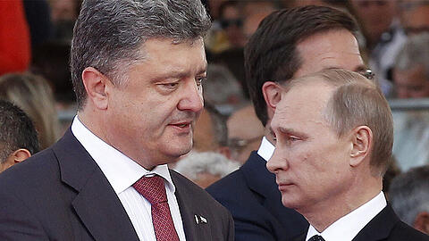 Der ukrainische Präsident Petro Poroschenko (l.) mit dem russischen Staatschef Wladimir Putin.