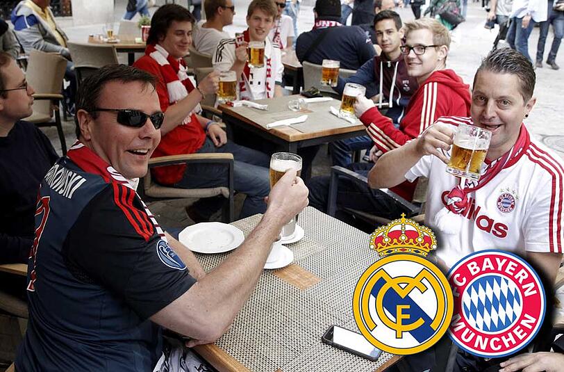 Ein Bier auf die Bayern: Die Fans, die dem Rekordmeister nach Madrid nachgereist sind, lassen's vor dem Spiel gegen Real schon mal krachen.
