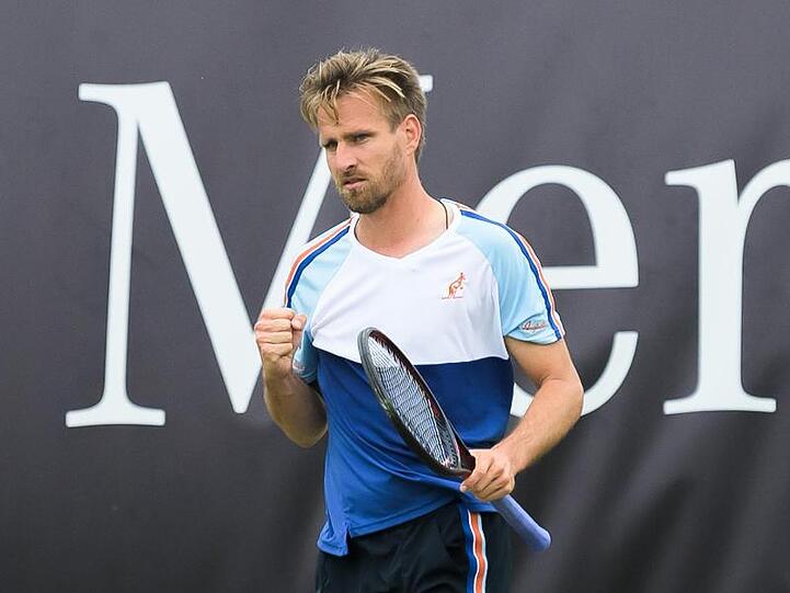Peter Gojowczyk ballt nach einem Ballwechsel im Match gegen Gilles Simon die Faust.