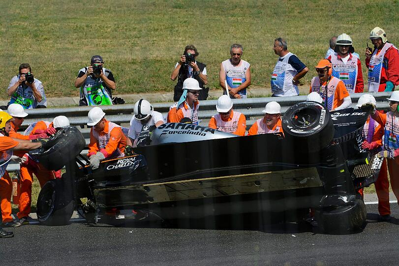 Force-India-Pilot Sergio Perez hat den Horror-Crash im ersten freien Training zum Großen Preis von Ungarn glimpflich überstanden.
