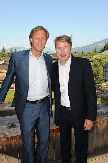 Gerhard Delling und Mika Häkkinen.