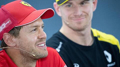 Vertreten die deutschen Farben in der Formel 1: Sebastian Vettel (l) und Nico Hülkenberg.
