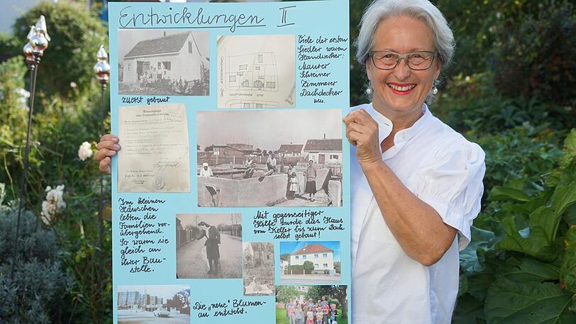 Inge Wiederhut vom Blumenauer Archiv stellt alte Fotos aus ihrer Siedlung aus.