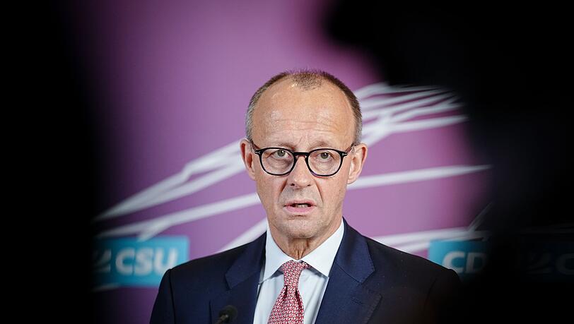 CDU-Chef Friedrich Merz richtet sich mit einer Warnung an die deutschen Fans.