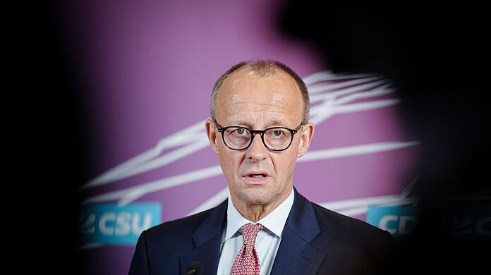 CDU-Chef Friedrich Merz richtet sich mit einer Warnung an die deutschen Fans.