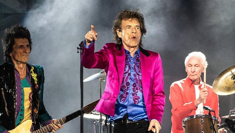 Mick Jagger (M.) wird mit seinen Rolling Stones im Sommer 2022 zwei Mal Halt in Deutschland machen.