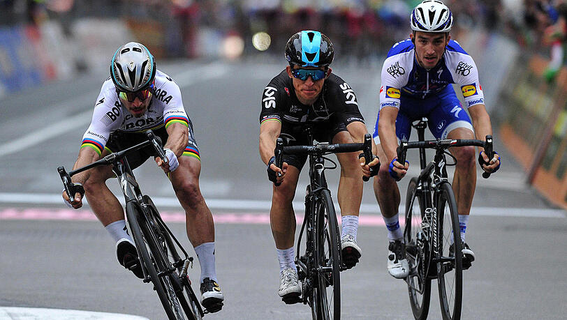 Michal Kwiatkowski (M) gewinnt vor Peter Sagan (L) und Julian Alaphilippe aus Frankreich. Michal Kwiatkowski (M) gewinnt vor Peter Sagan (L) und Julian Alaphilippe aus Frankreich.