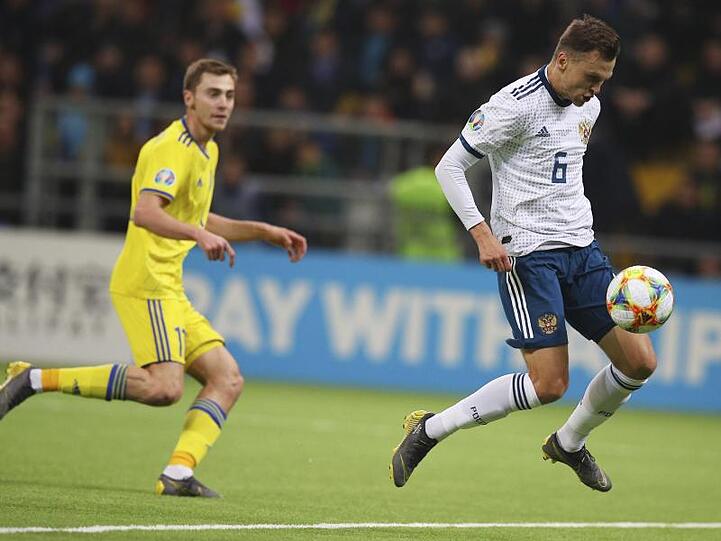 Traf gleich zweimal in Astana: Russlands Denis Tscheryschew (re).