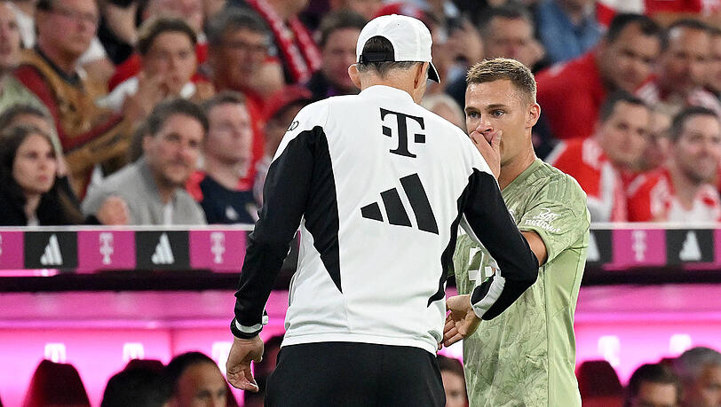 Thomas Tuchel (li.) und Joshua Kimmich hatten gegen Leverkusen Redebedarf.