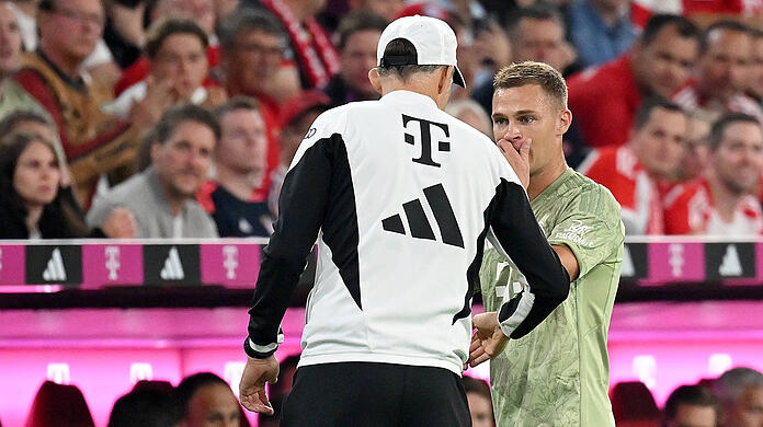 Thomas Tuchel (li.) und Joshua Kimmich hatten gegen Leverkusen Redebedarf.