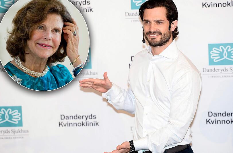 Stolz zeigt Prinz Carl Philip von Schweden der Presse, wie groß sein eben geborener Junge ist. Seine Mutter Königin Silvia hat ihren Enkel nicht sofort im Krankenhaus besucht.