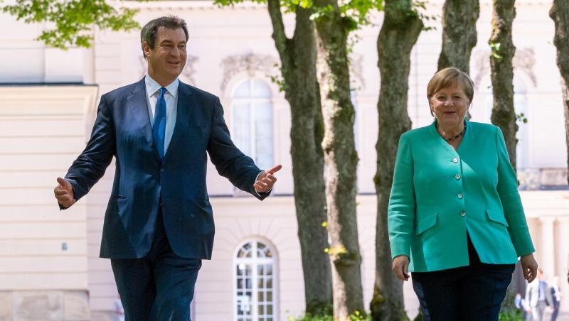 Markus Söder (CSU), Ministerpräsident von Bayern, und Bundeskanzlerin Angela Merkel (CDU). Foto: Peter Kneffel/dpa/Pool/dpa Markus Söder (CSU), Ministerpräsident von Bayern, und Bundeskanzlerin Angela Merkel (CDU). Foto: Peter Kneffel/dpa/Pool/dpa