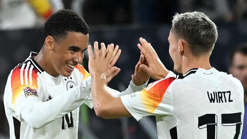 Der eine spielt beim FC Bayern, der andere soll kommen: Jamal Musiala und Florian Wirtz.