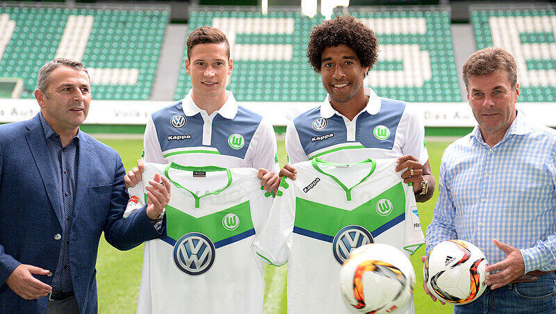 Attacke auf die Bayern: Wolfsburg will mit Manager Klaus Allofs (l-r), Julian Draxler, Dante und Trainer Dieter Hecking wieder angreifen Attacke auf die Bayern: Wolfsburg will mit Manager Klaus Allofs (l-r), Julian Draxler, Dante und Trainer Dieter Hecking wieder angreifen