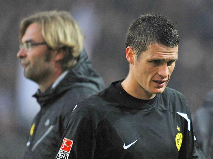 Muss weitere drei Wochen auf Sebastian Kehl (r.) verzichten: BVB-Coach Jürgen Klopp-